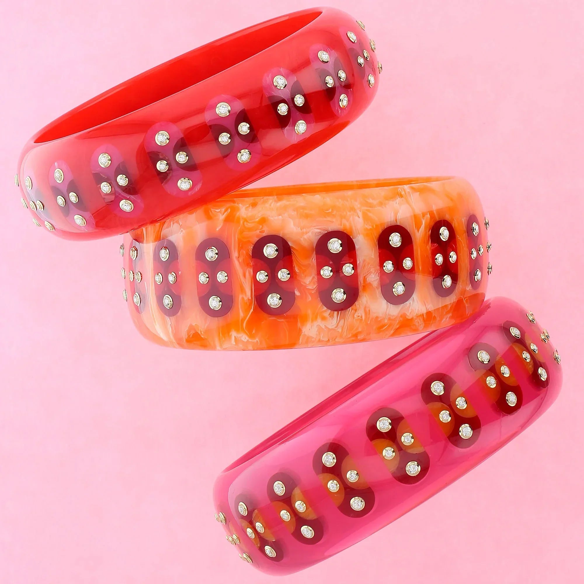 Adler Bangle | Bright red bakelite with inlay and stones.