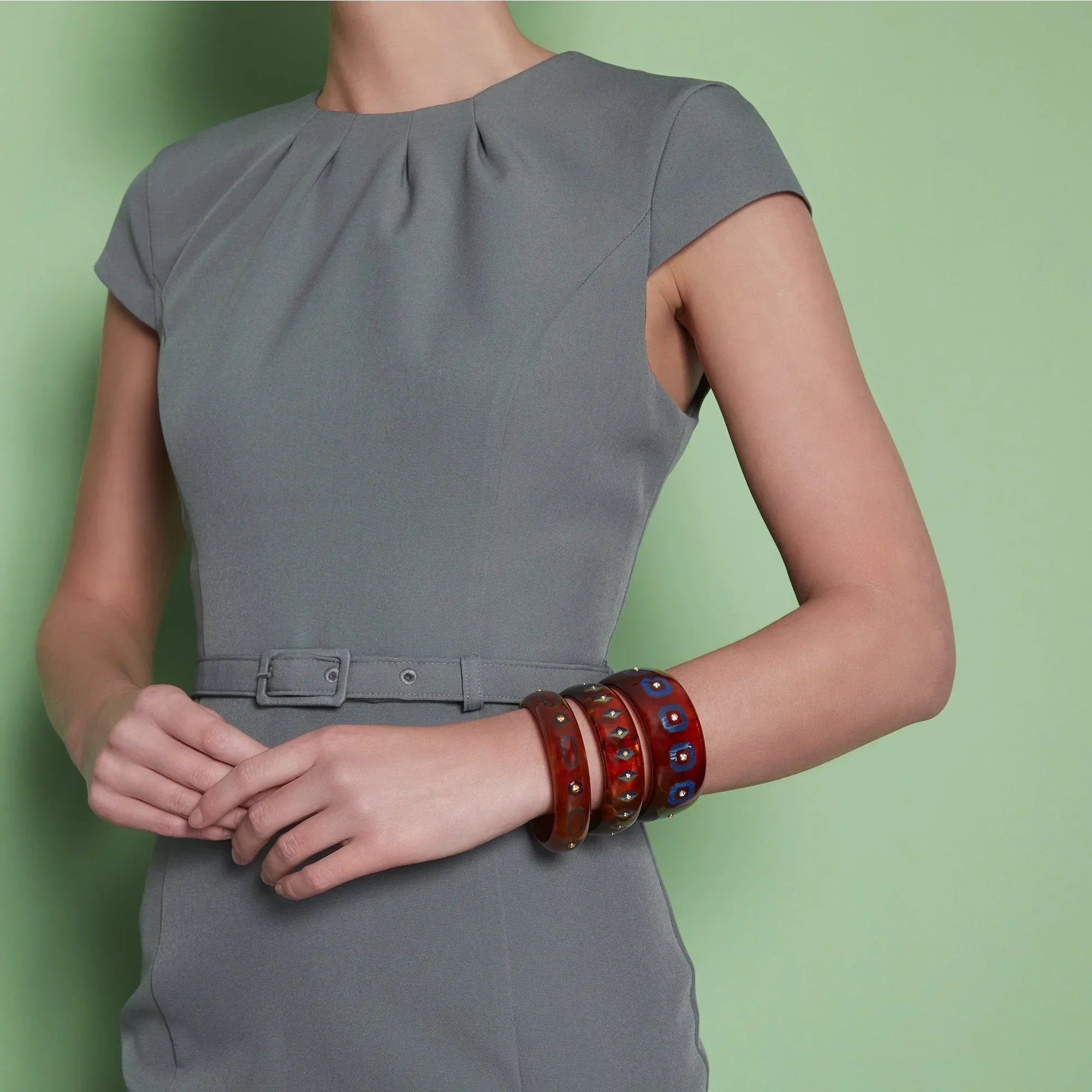 Helena Bangle | Bakelite bangle with inlay and spessartite garnet stones.