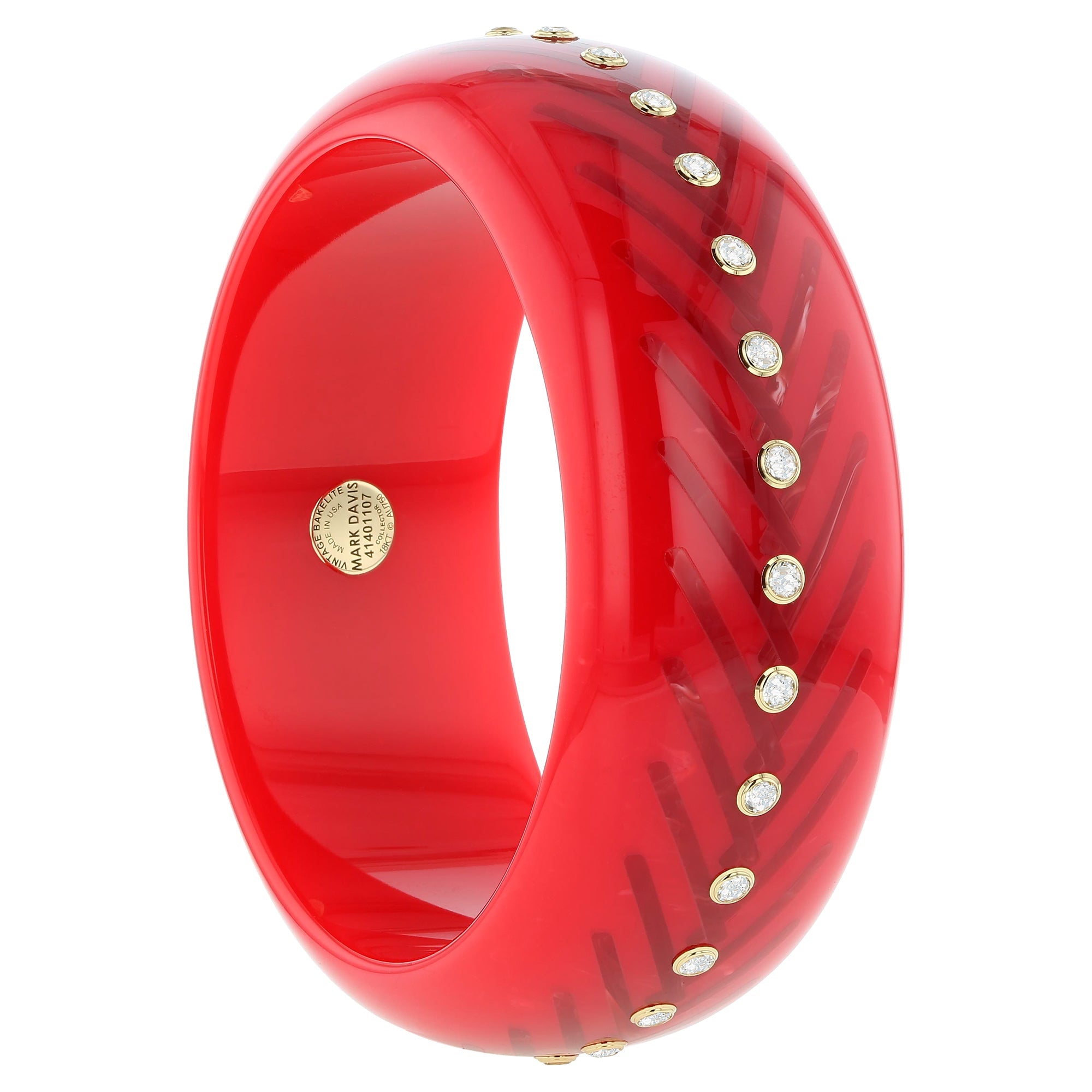 Mara Bangle | Bakelite bangle with an arrow pattern inlay and stones.